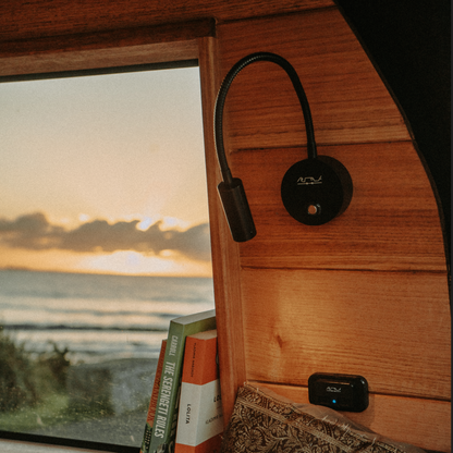 Wall-mounted van life reading light with flexible neck and USB charger